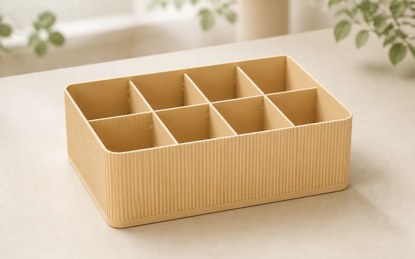 Ribbed Storage Studio showing a warm ivory compartment organizer with vertical ribs.